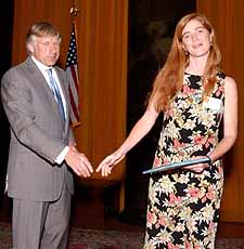 Lee Bollinger presents Samantha Power with her Pulitzer prize